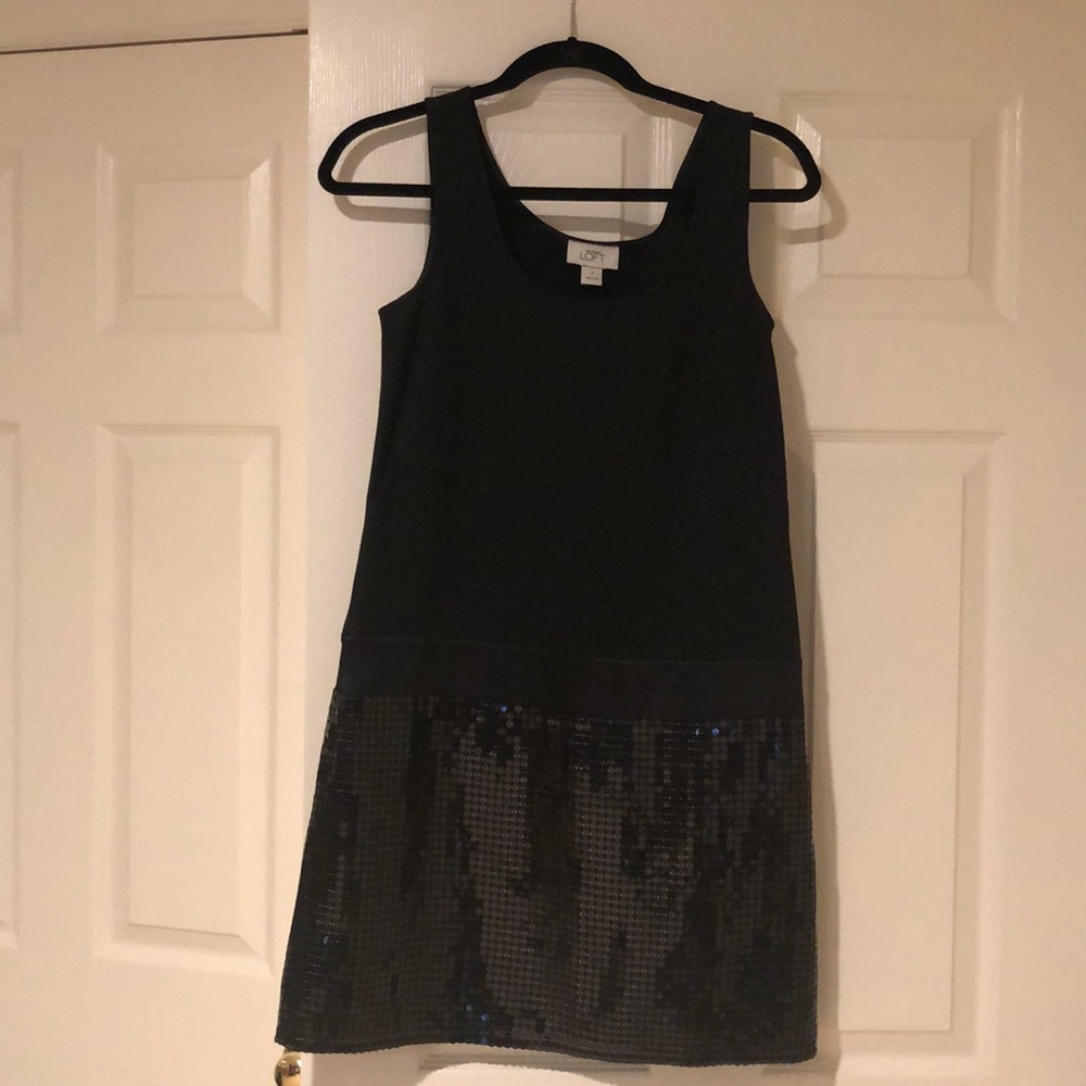 Black sleeveless dress with sequin bottom